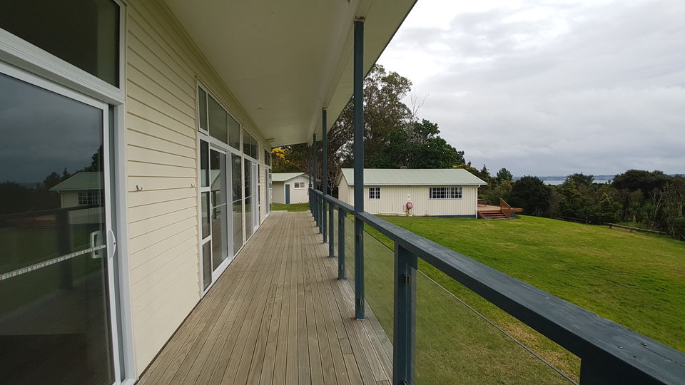 The cabin veranda and sliding glass doors